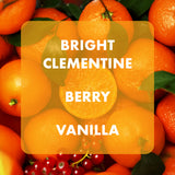 Oranges with berries and text overlay 'Bright Clementine Berry Vanilla'