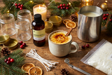 bottle of eggnog brulee Fragrance2U fragrance oil sitting on a surface with candle making supplies