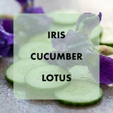 Cucumber slices with iris and lotus flowers on a textured surface